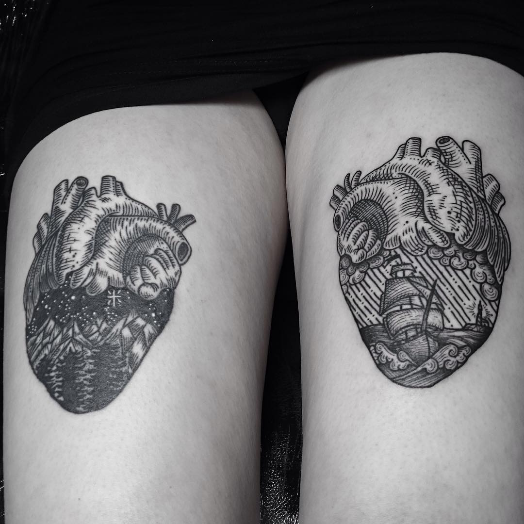 two heart tattoos on thighs