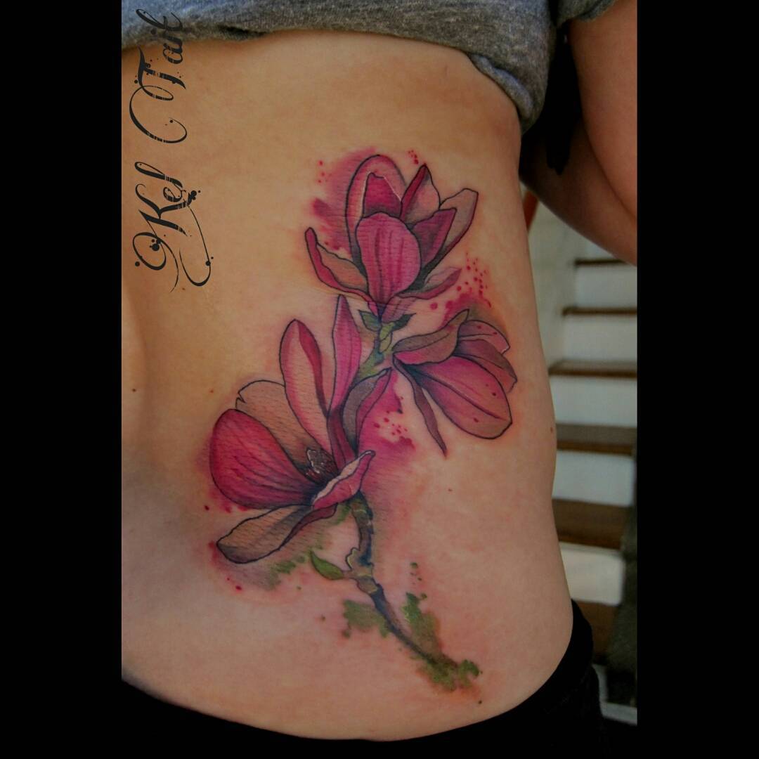 flower tattoo on ribs