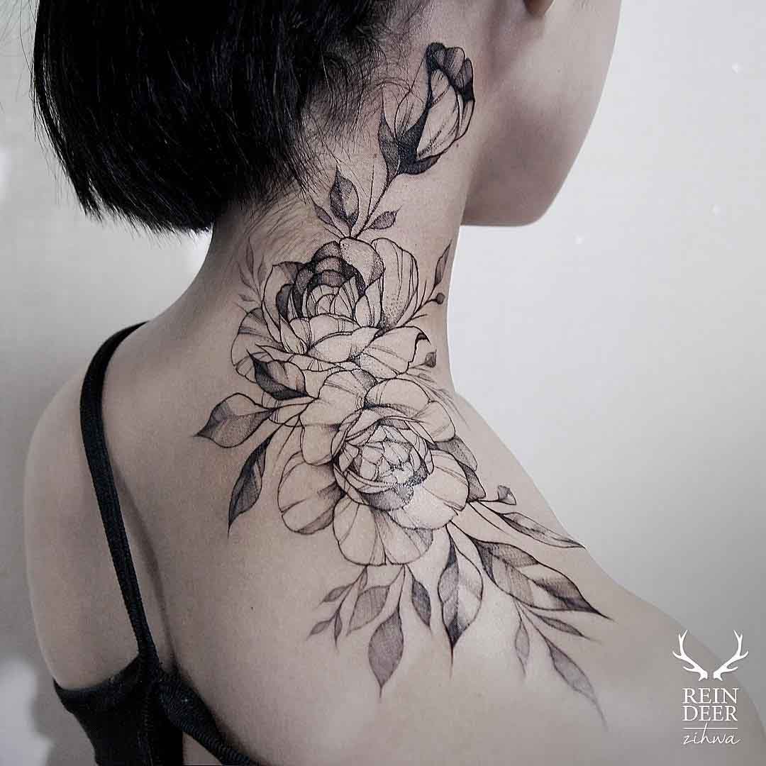 shoulder to neck tattoo of roses