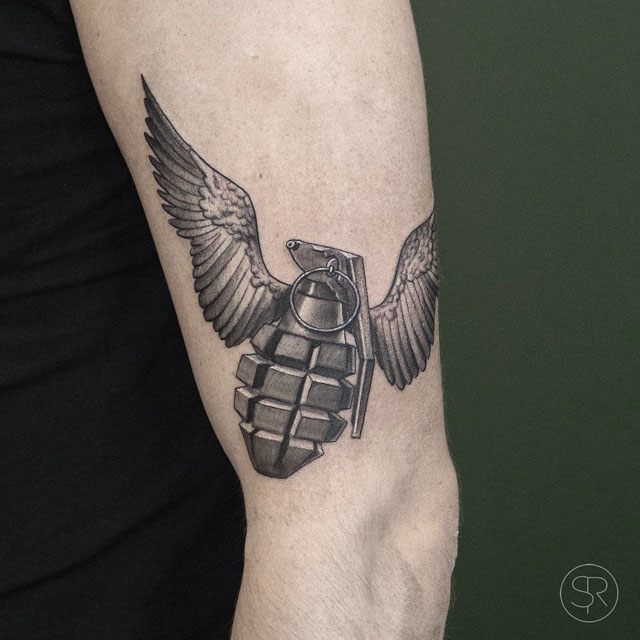 flying grenade tattoo with wings