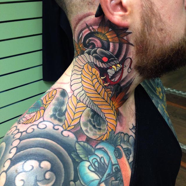 neck tattoo cobra snake