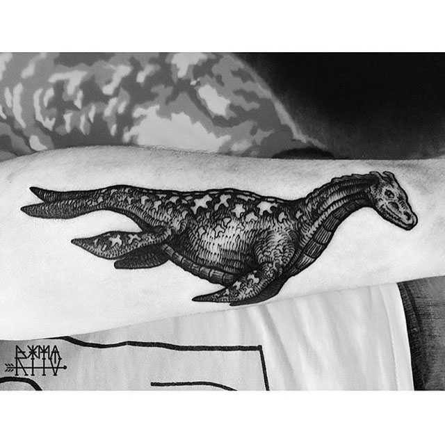 dragon tattoo on arm