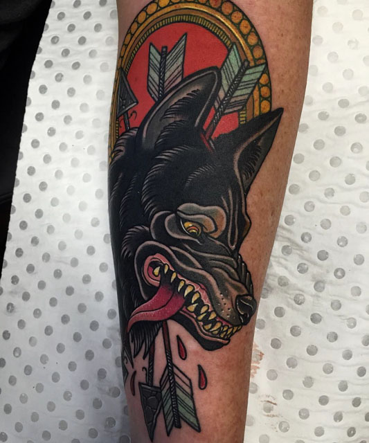 killed wolf traditional tattoo