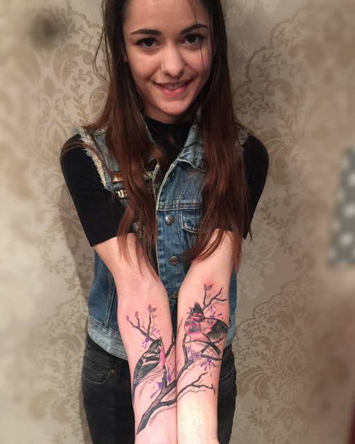 split tattoo on arms