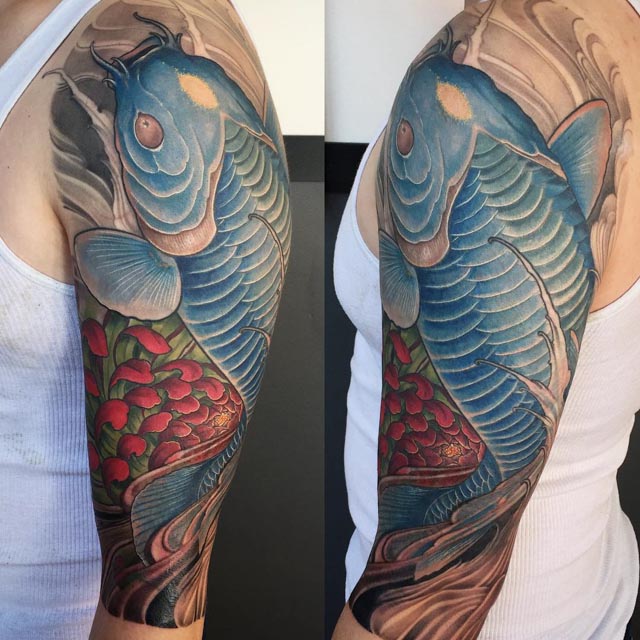 blue koi fish tattoo on shoulder