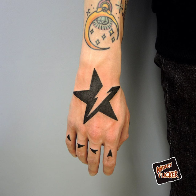 star tattoo on hand