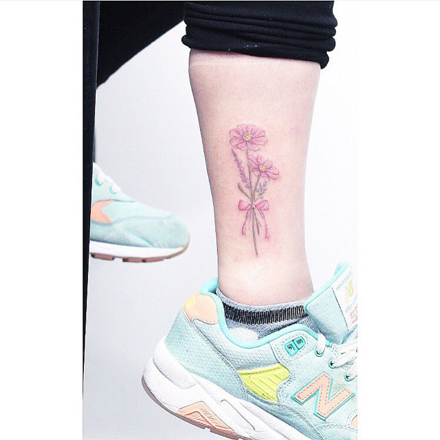 small pink flowers tattoo