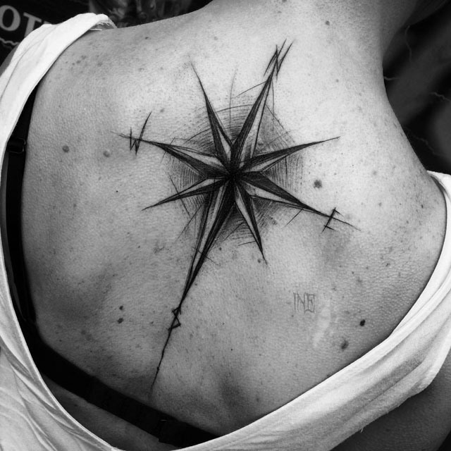 Back tattoo compass