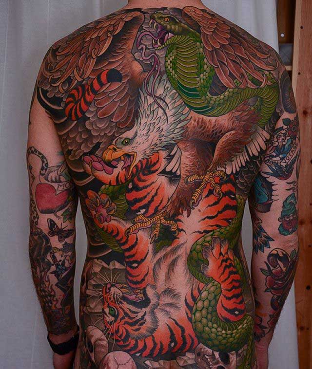 animal fight full back tattoo