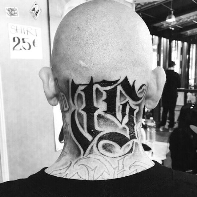 back neck Chicano tattoo