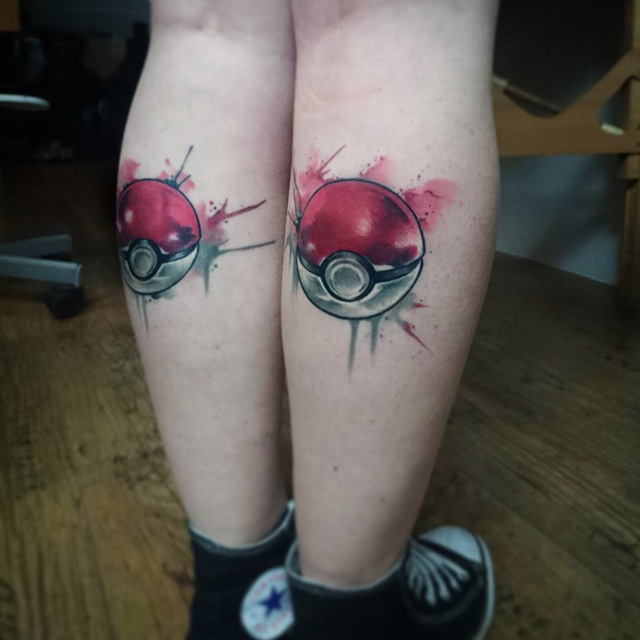 calf pokeball tattoo watercolor