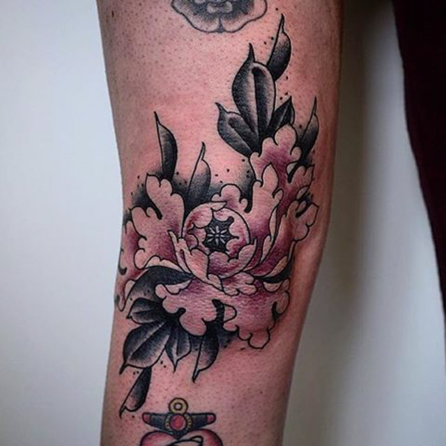 Above Knee Tattoo