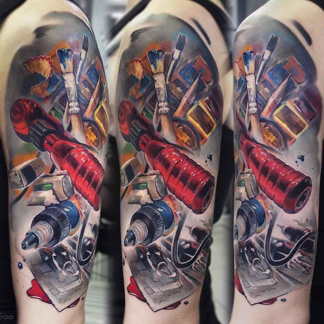 artist tools tattoo on shoulder