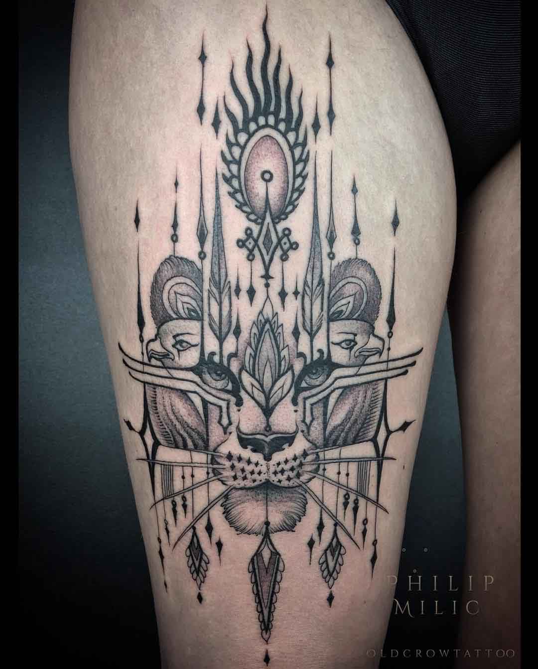 bastet tattoo on thigh