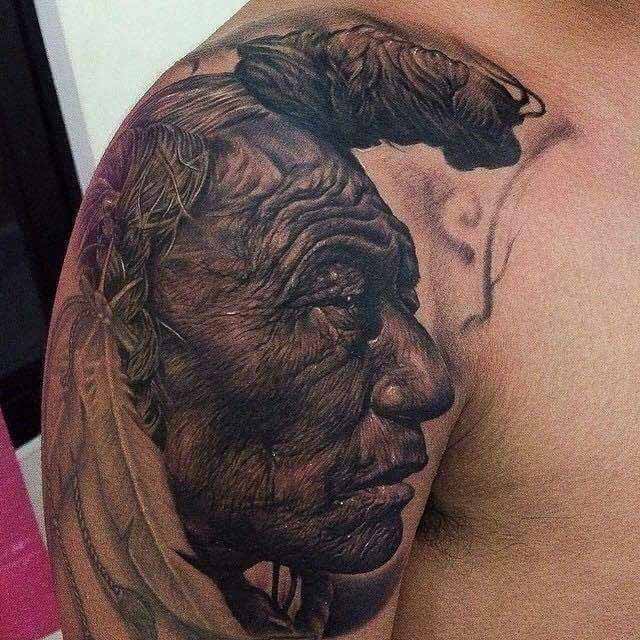 Realistic Indian Tattoo on Shoulder by Koko Goldfinger Tattoo Studio