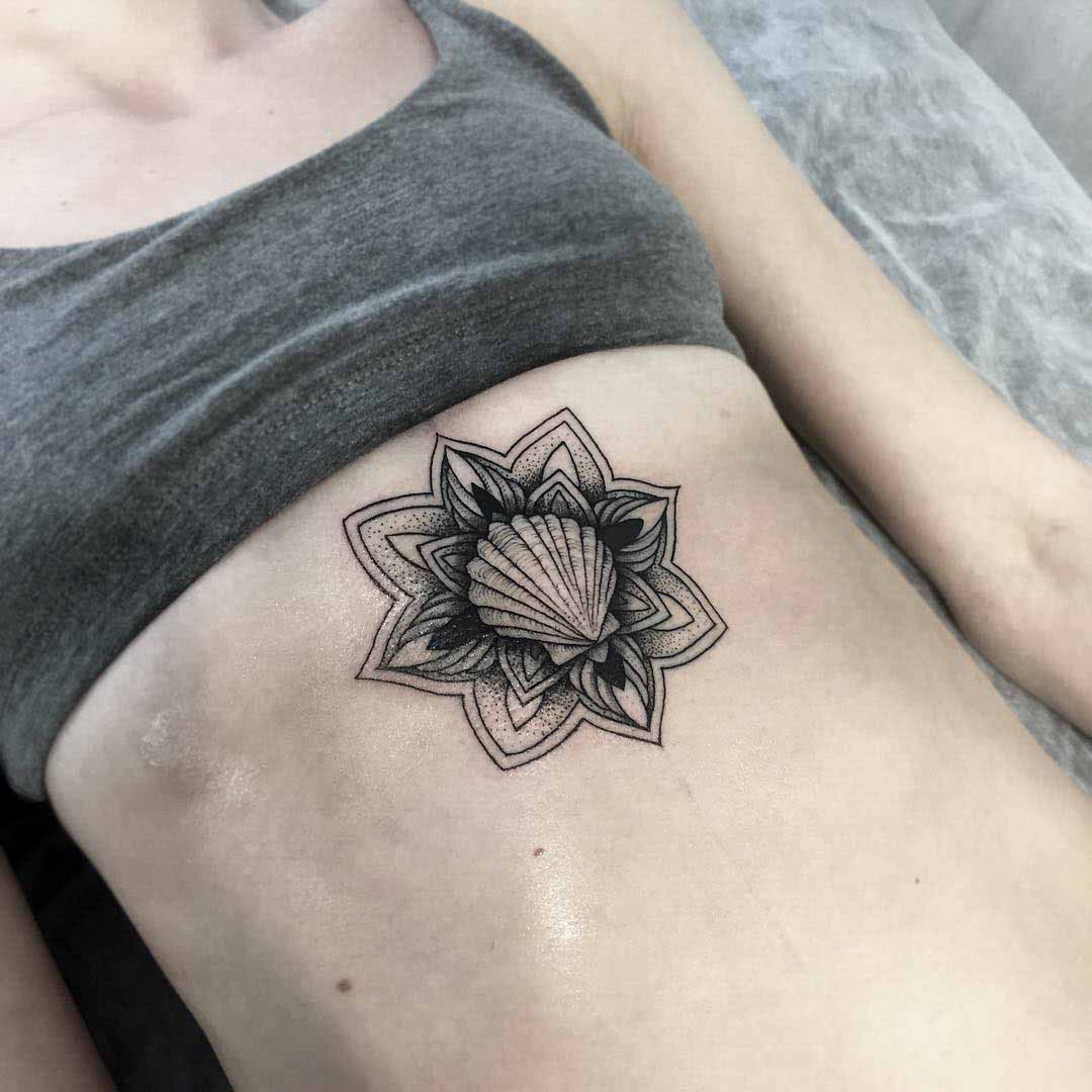 dotwork tattoo shell mandala