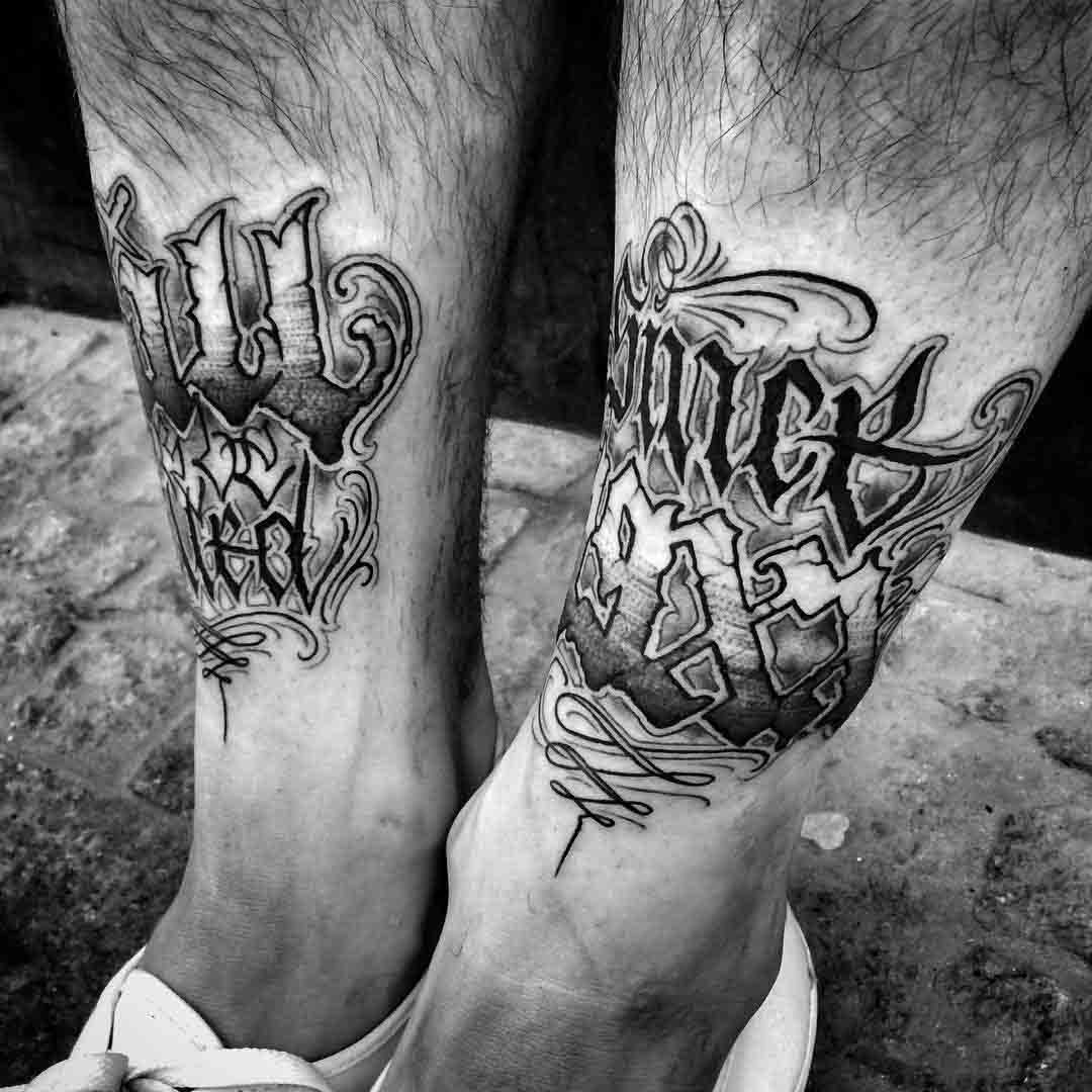 Chicano Font Shin Tattoos by goorazz