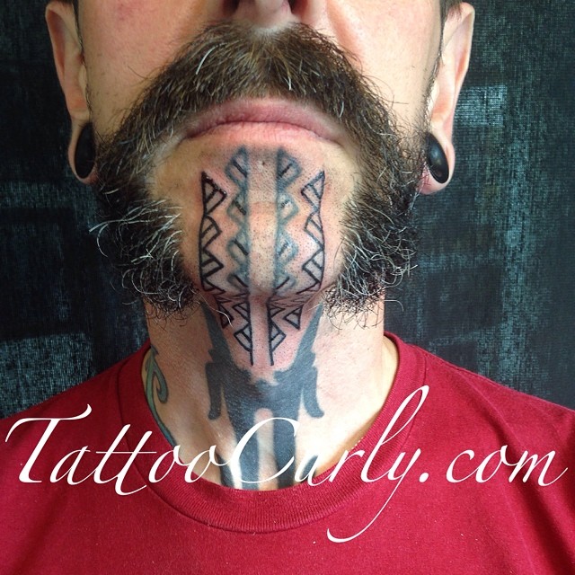 Ethnic Chin Tattoo by curlytattoo