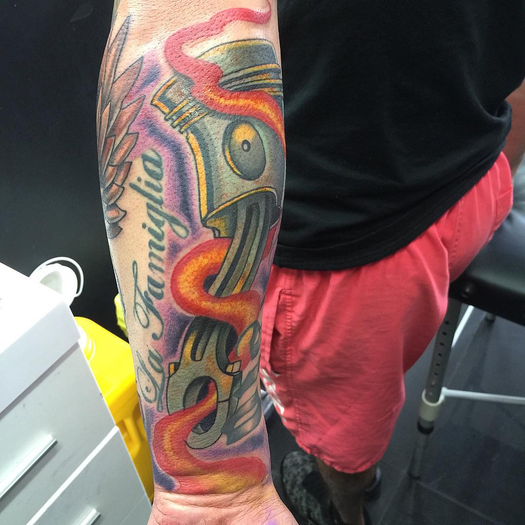 Piston Flame Tattoo by jayboytattoo