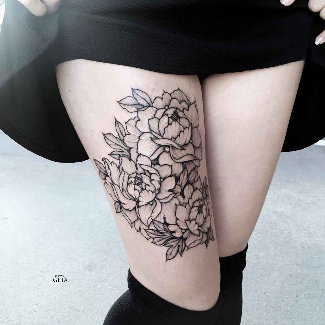 thigh tattoo flowers