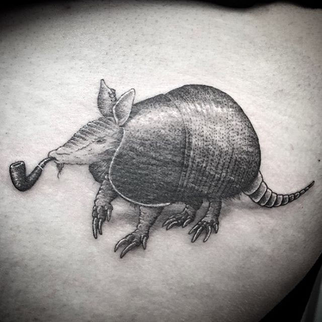 graphic armadilo tattoo