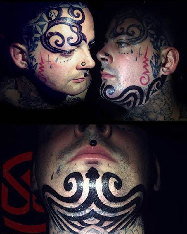 Big Tribal Tattoo on Chin by toukavoodoo