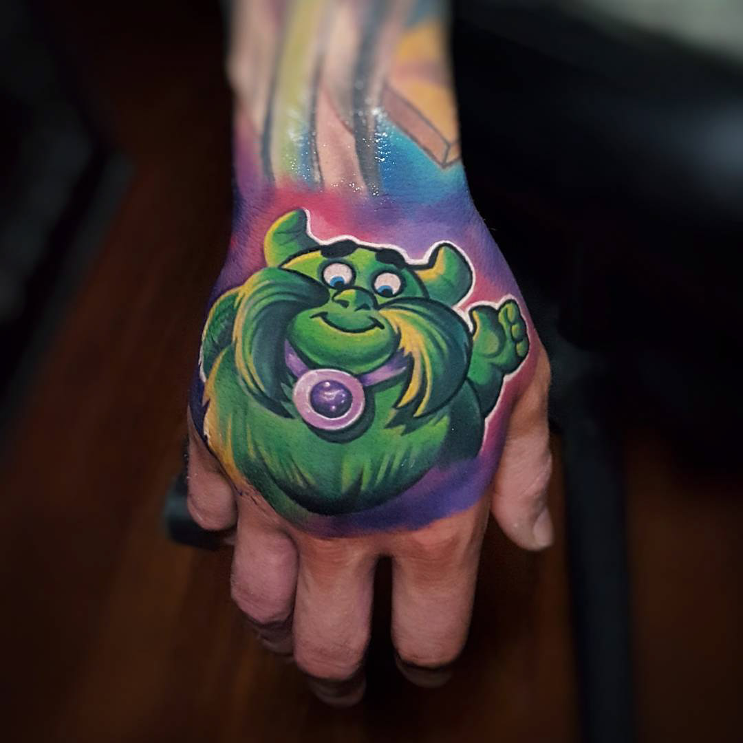 hand tattoo cartoon candy land