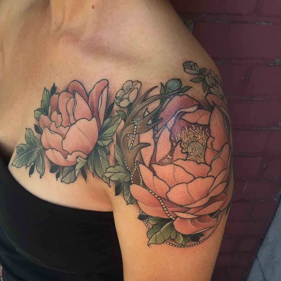 breast to shoulder flowers tattoo