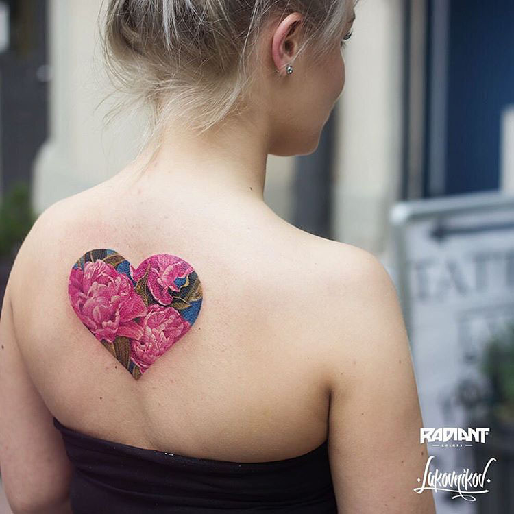 back hearts flower tattoo