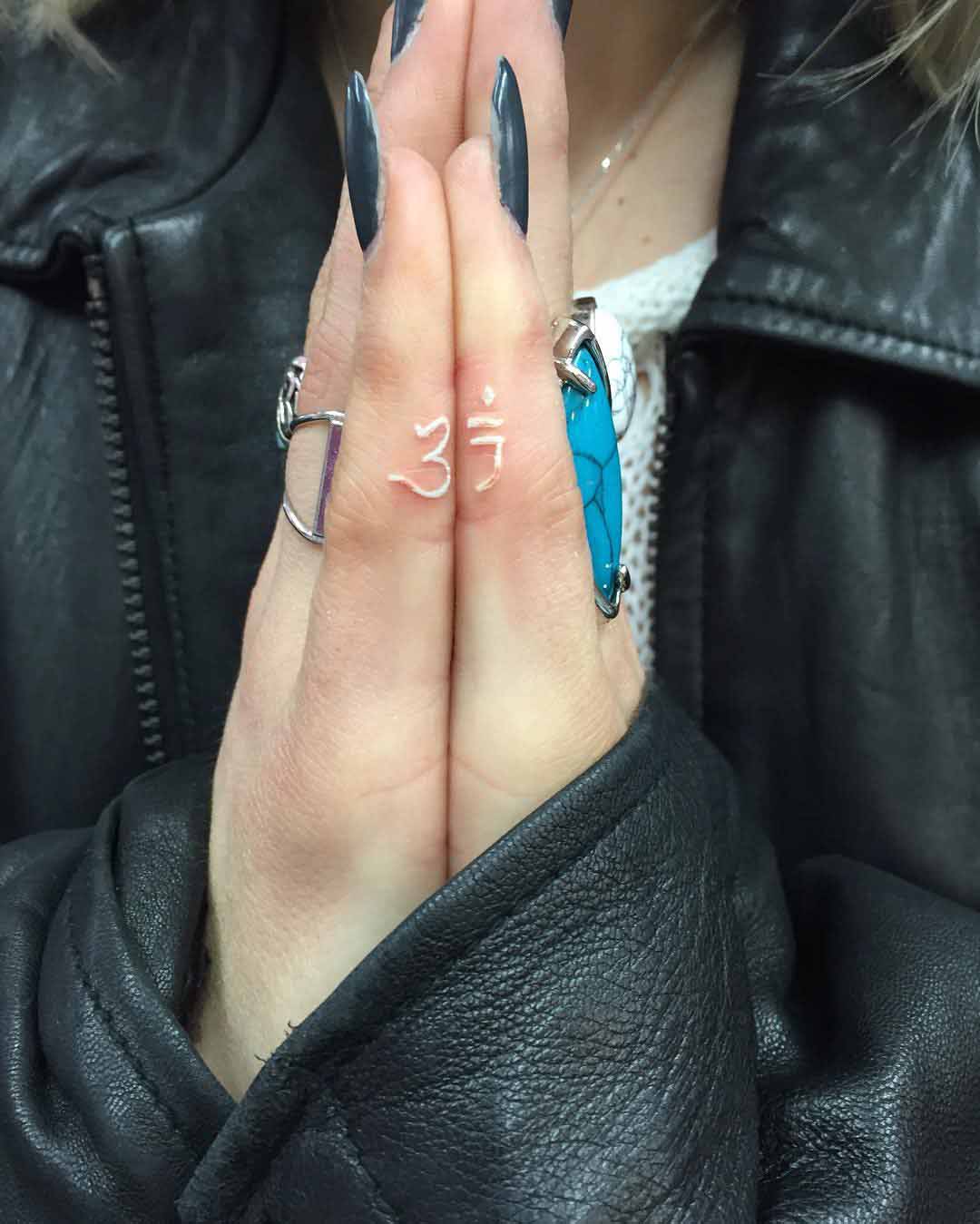 White Hindu Finger Tattoos by brittholdthebrat