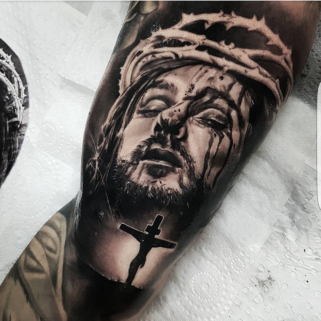 jesus on bicep by Benji_Roketlauncha