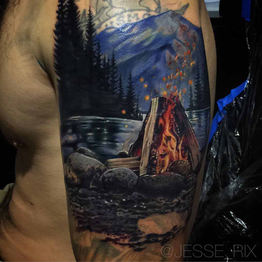 shoulder cover-up tattoo campfire