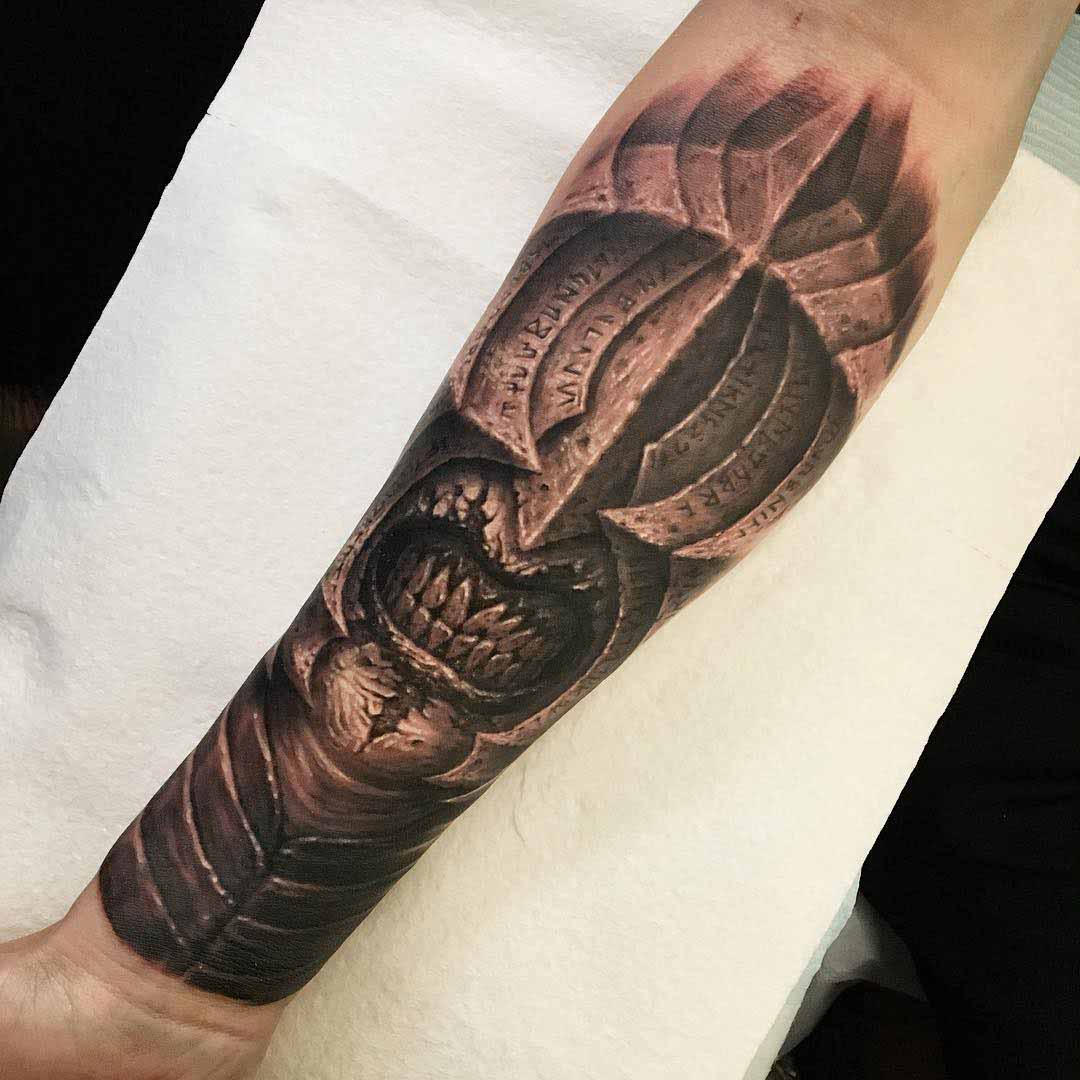 Sauron tattoo on forearm