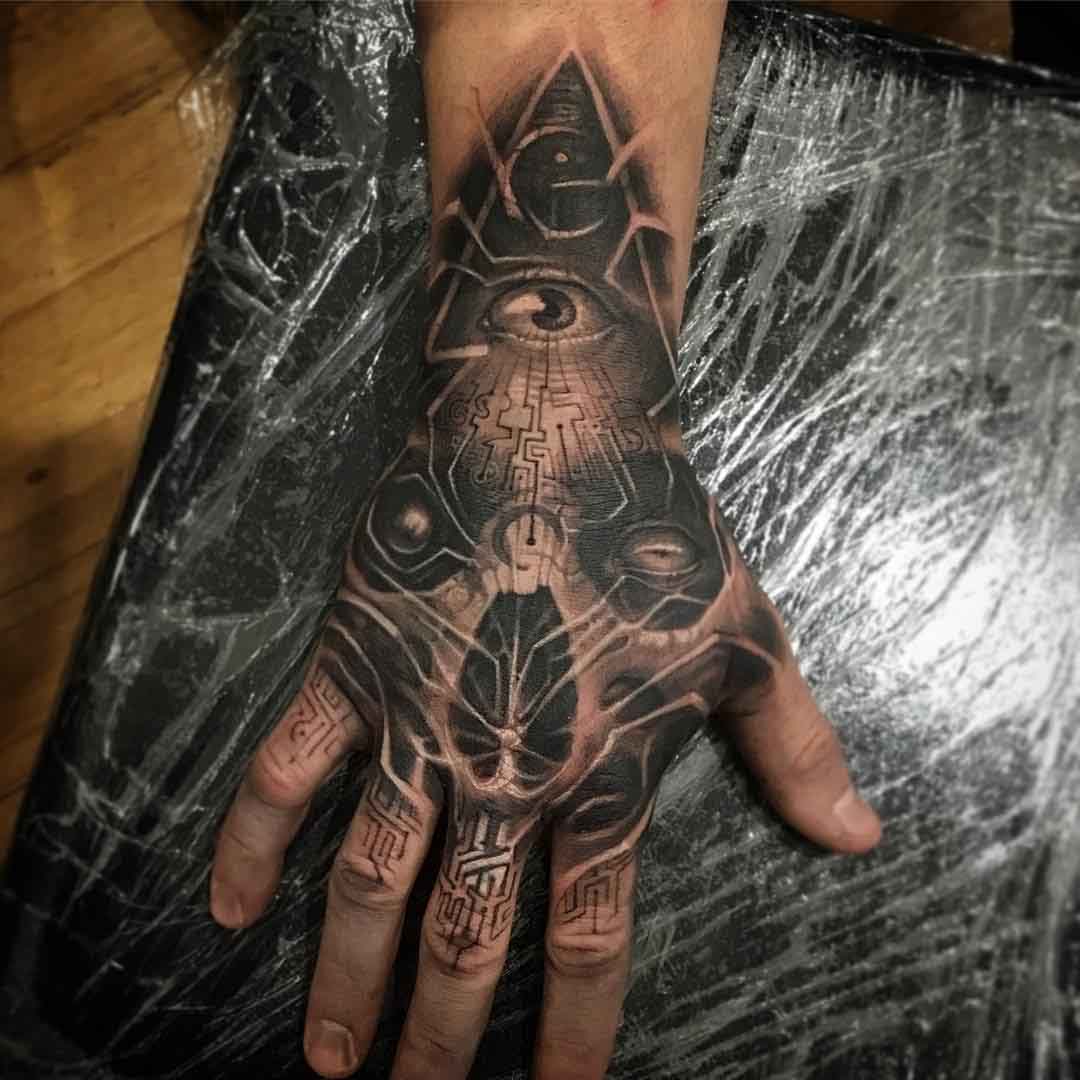 skull hand tattoo