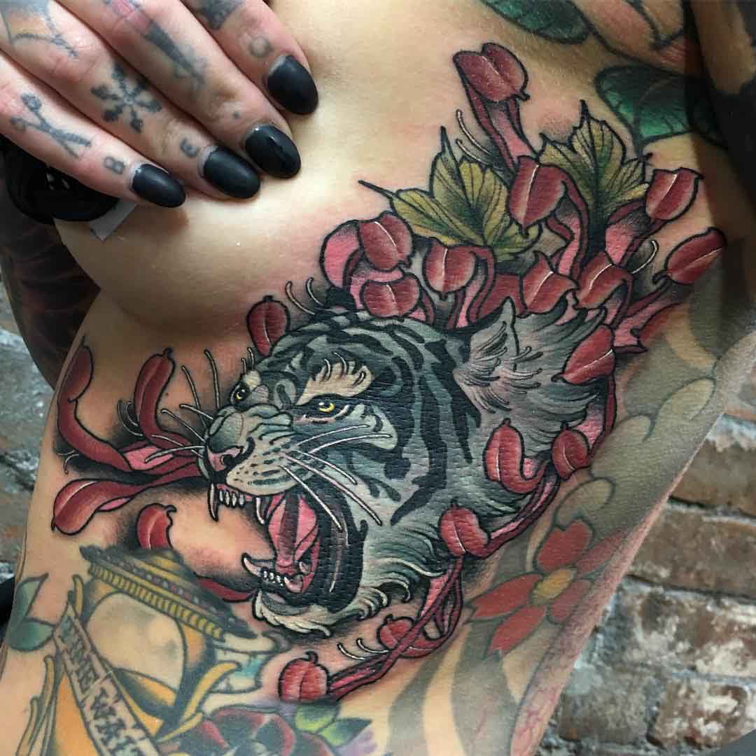 tiger tattoo on ribs oriental for girls