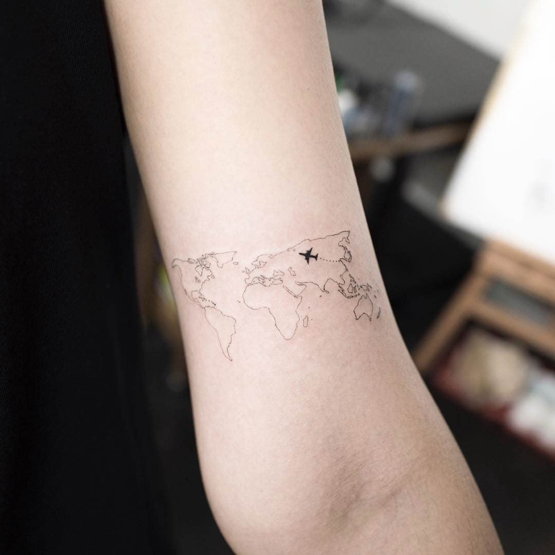 world map tattoo small plane