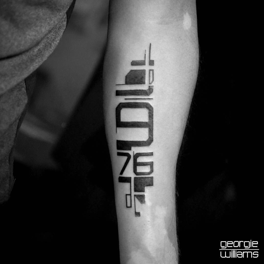 numbers tattoo on arm