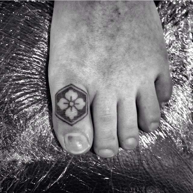 toe tattoo clover stamp