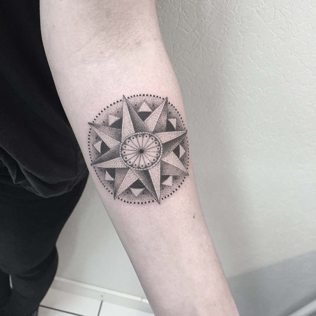 dotwork tattoo on arm