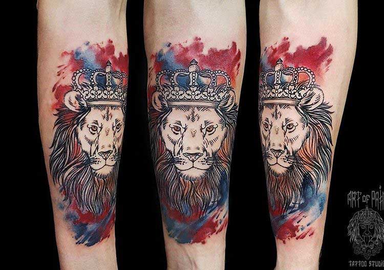 arm tattoo lion with crown