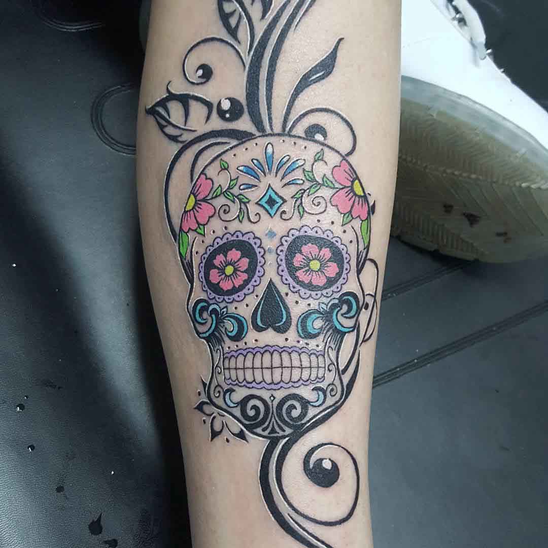 sugarskull tattoo on shin