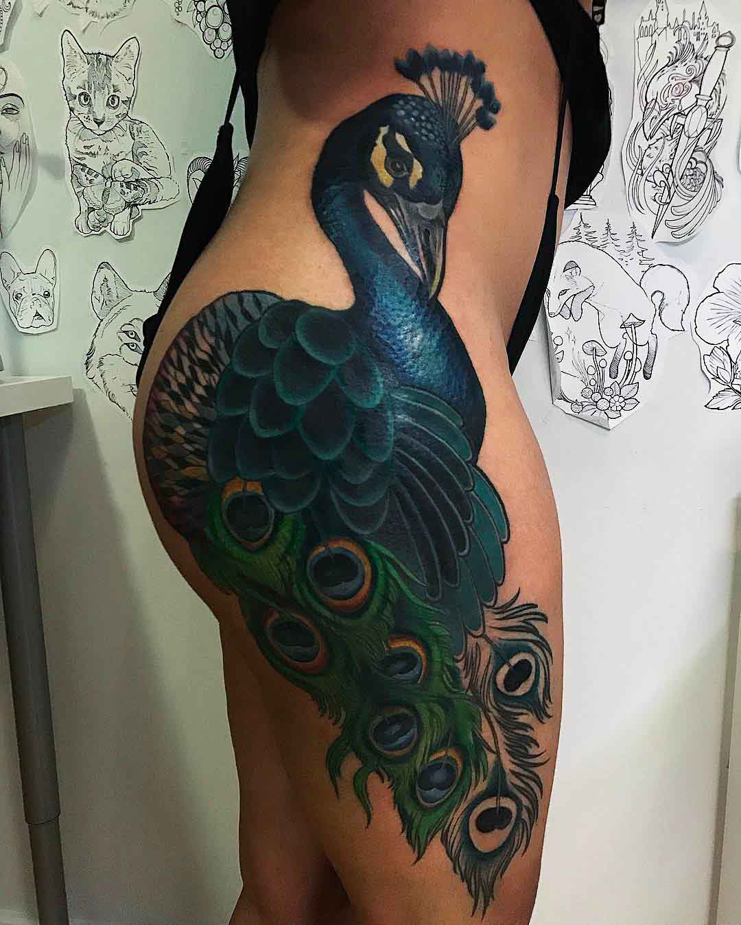 hip tattoo peacock