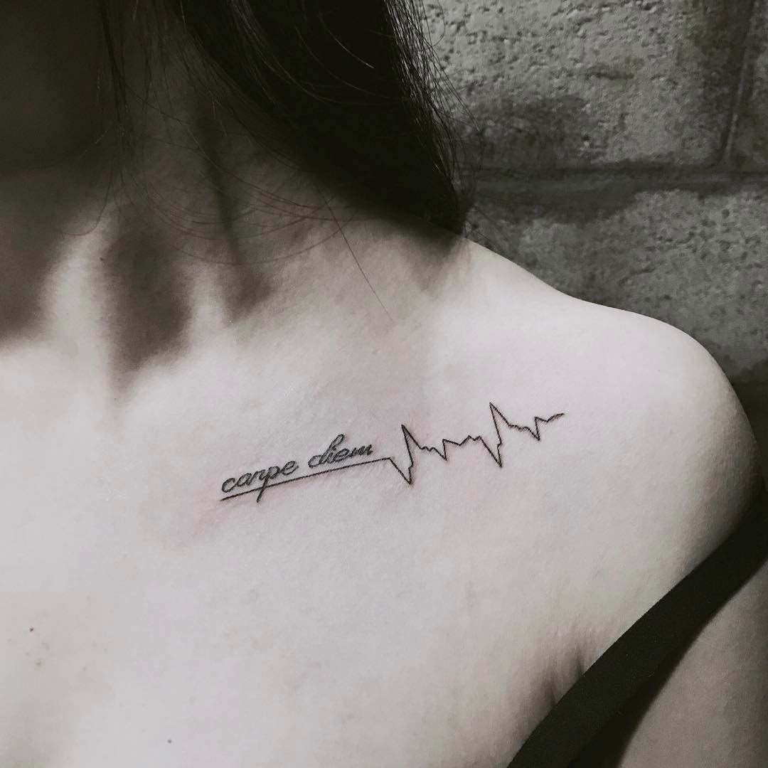 collar bone tattoo carpe diem lettering