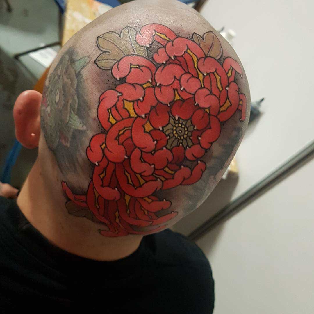 head tattoo red flower