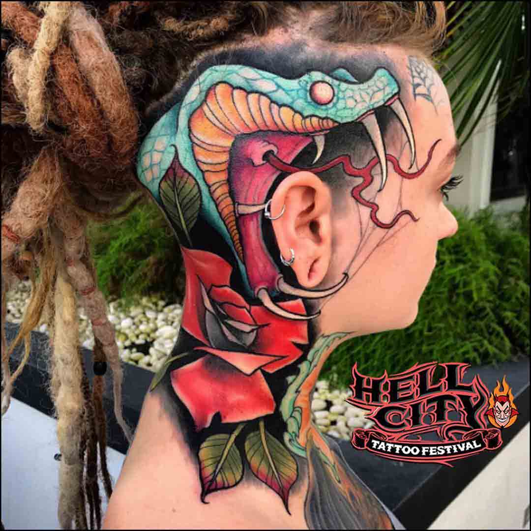 side head tattoo of snake