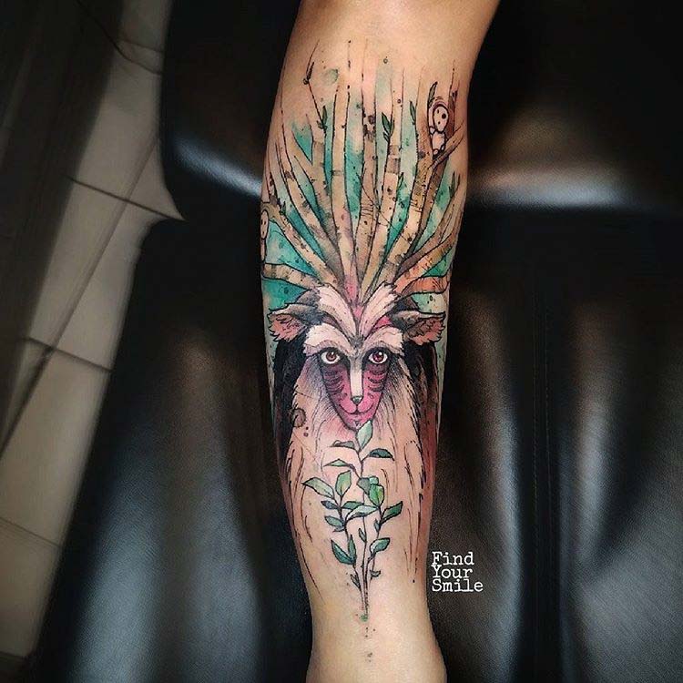 arm tattoo forest spirit