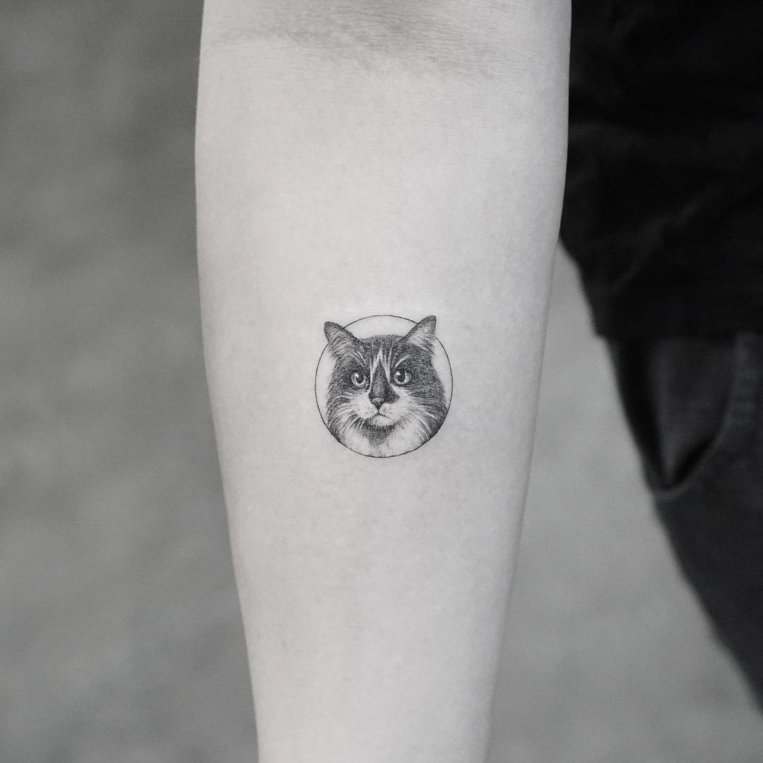 cat face tattoo small