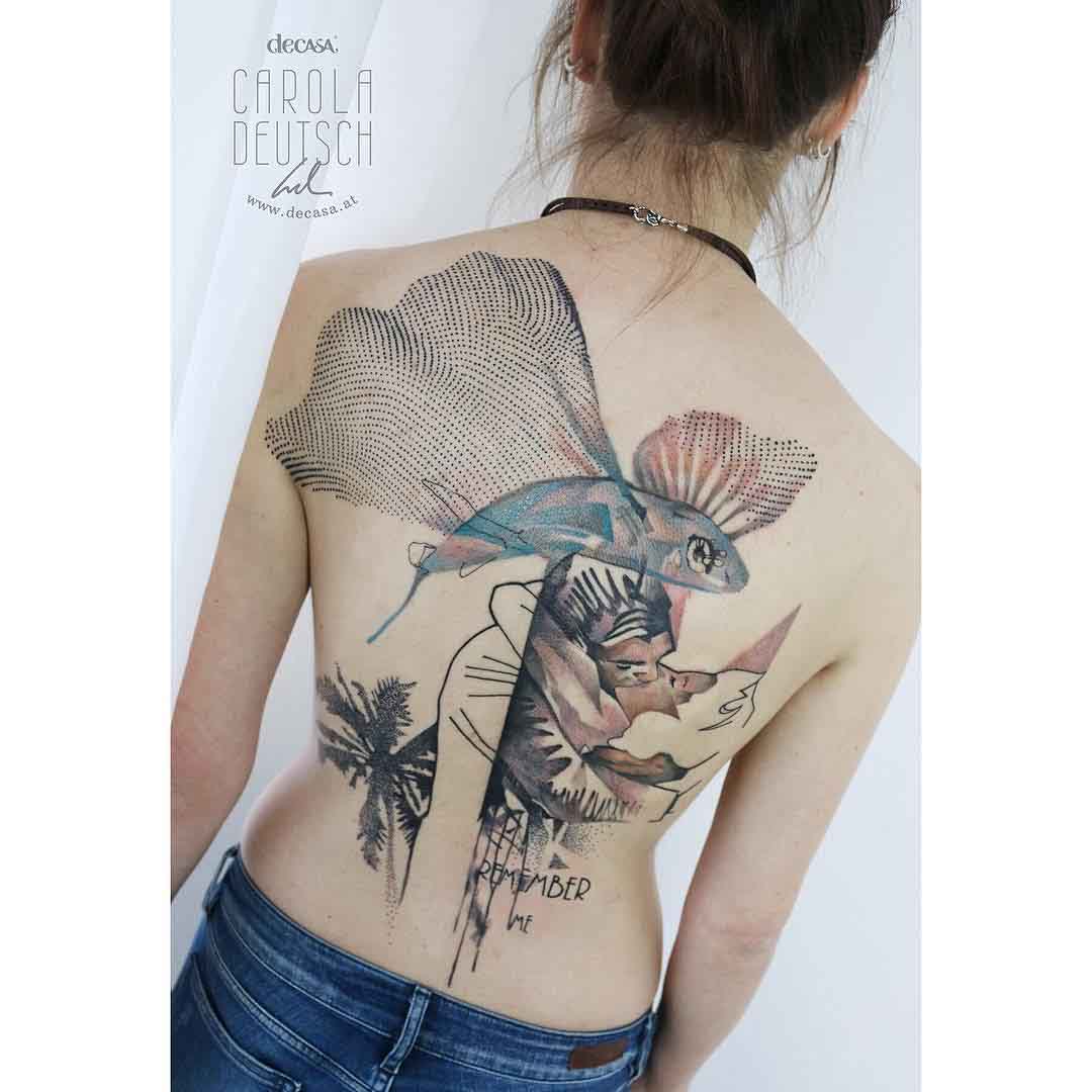 flying fish tattoo on back