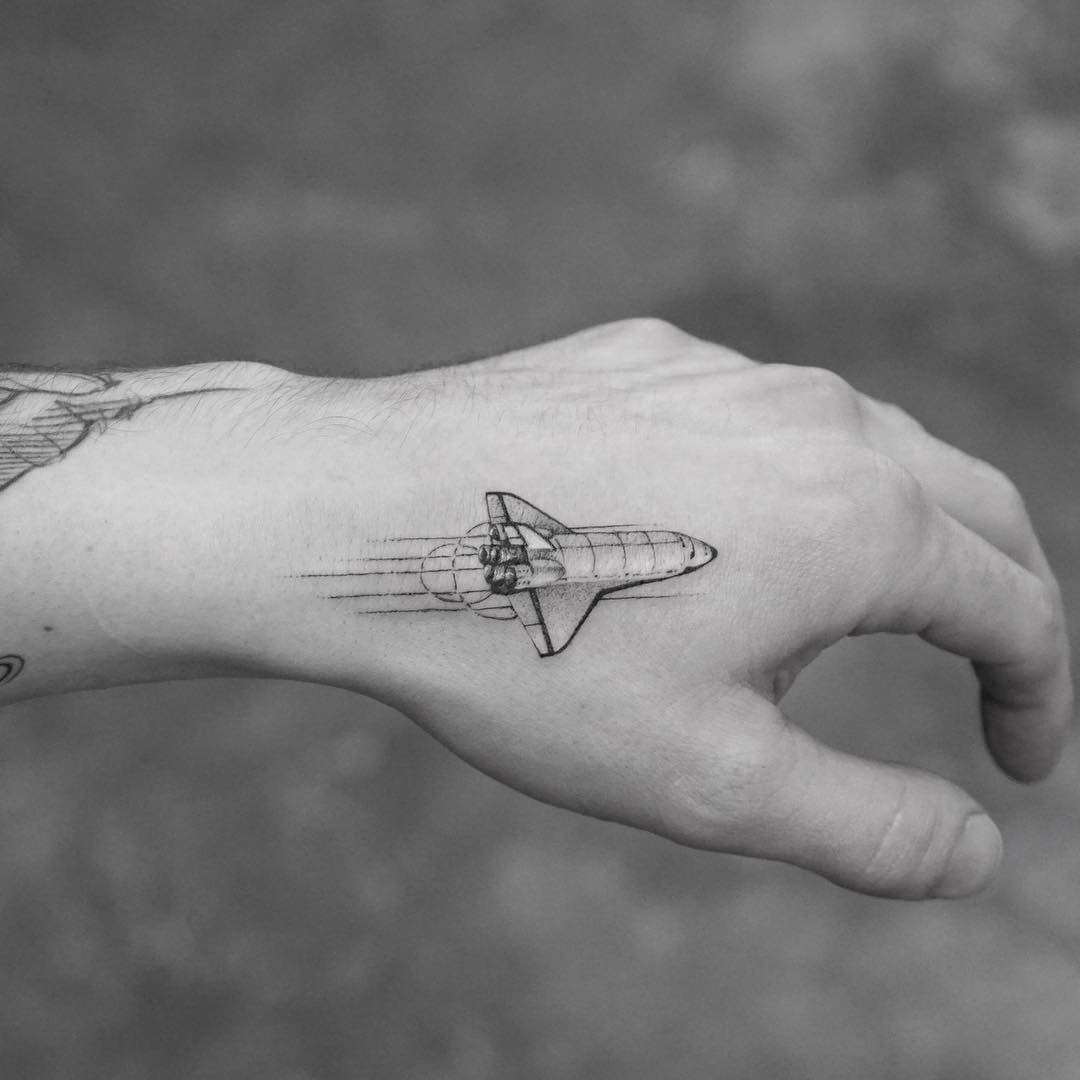 small shuttle tattoo