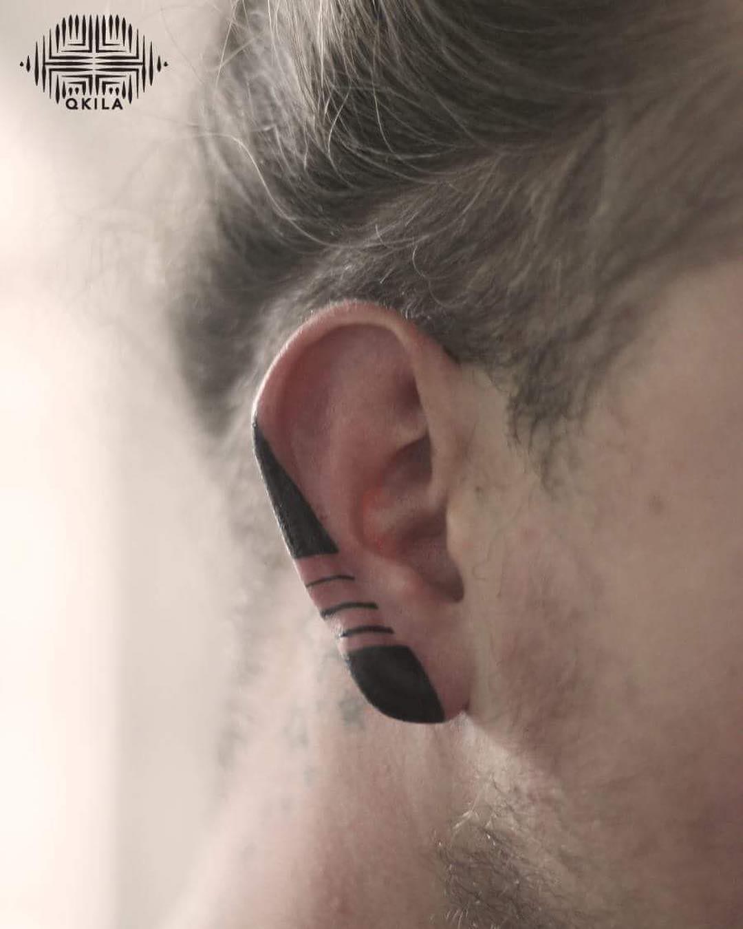 ear tattoo blackwork